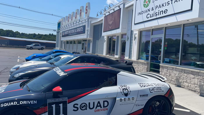 King, a noted car enthusiast, brought in a number of cars to help promote the barbershop. (Ethan Hurwitz/Patriots Country)